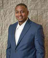 OCU Student Wearing Suit