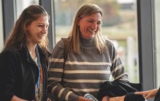 Event Staff Speaking with Students On Campus