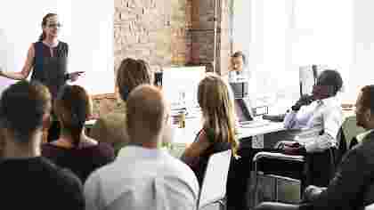 OCU Online marketing class lecture with adult students
